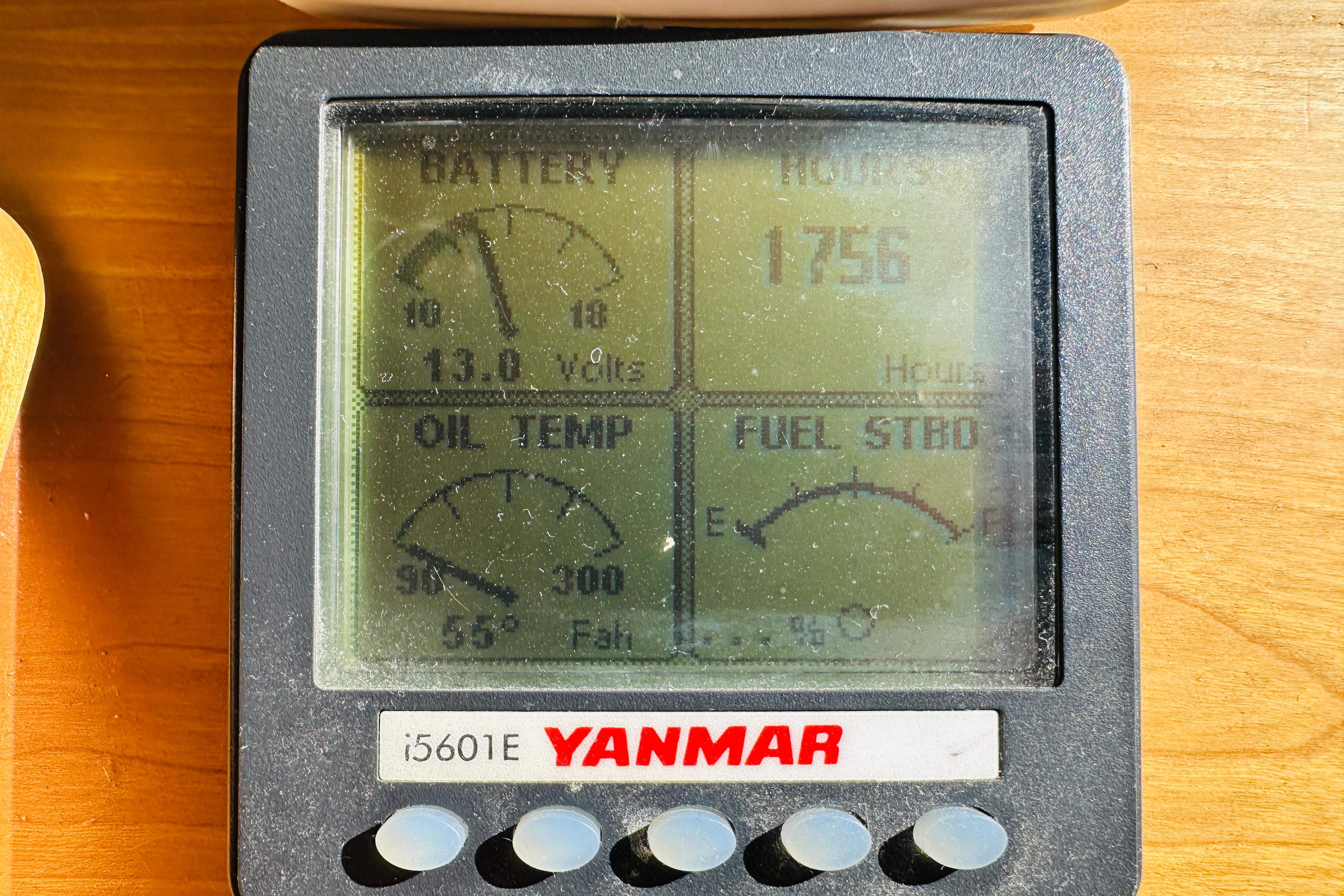 Yanmar engine display showing battery, oil temperature, hours, and fuel status on 2006 Sabre 42 Fly Bridge.