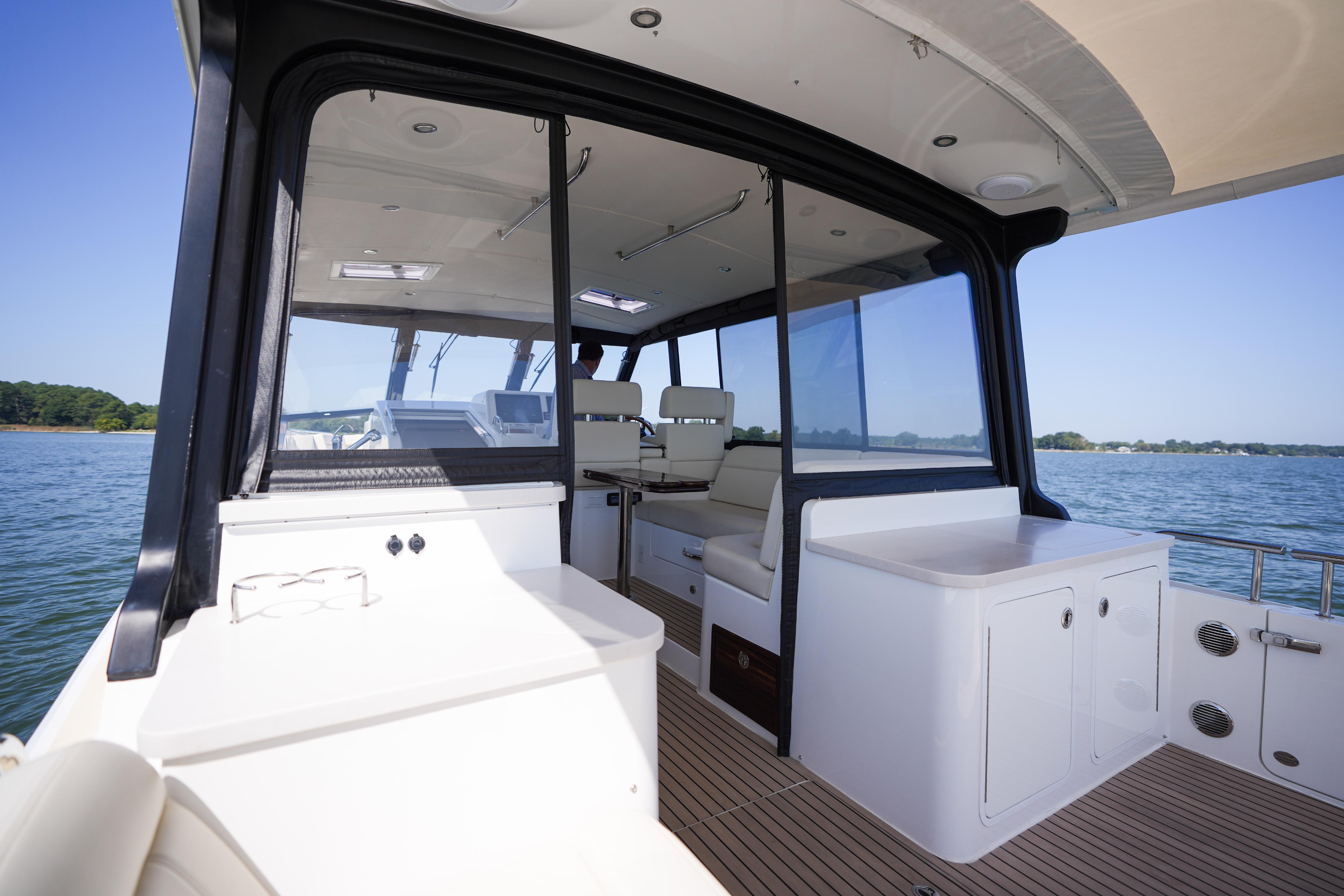 2023 MJM Yachts 4 interior view, featuring sleek design and spacious seating on the water.
