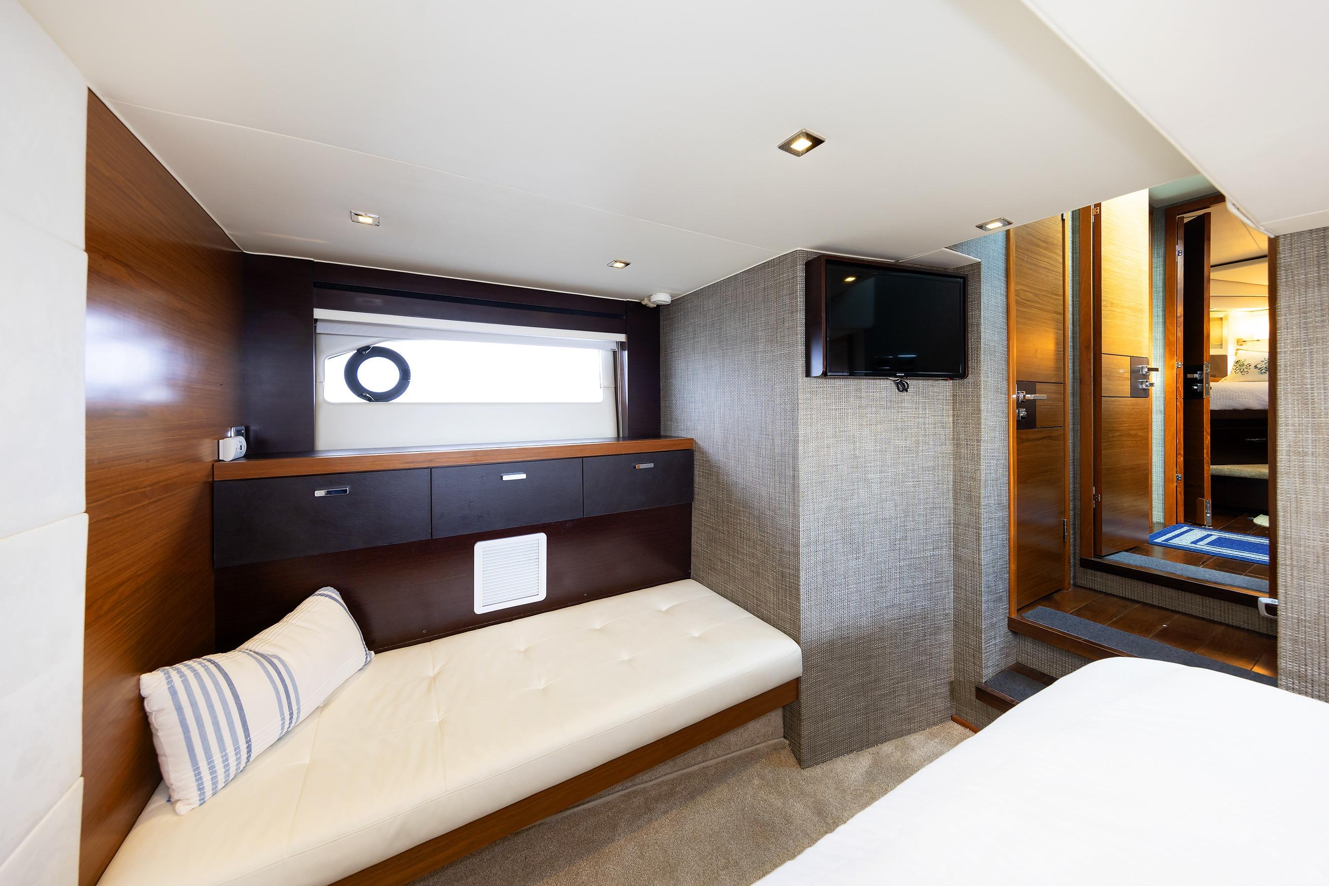 Luxurious interior of 2014 Tiara 5000 Coupe yacht with modern furnishings.