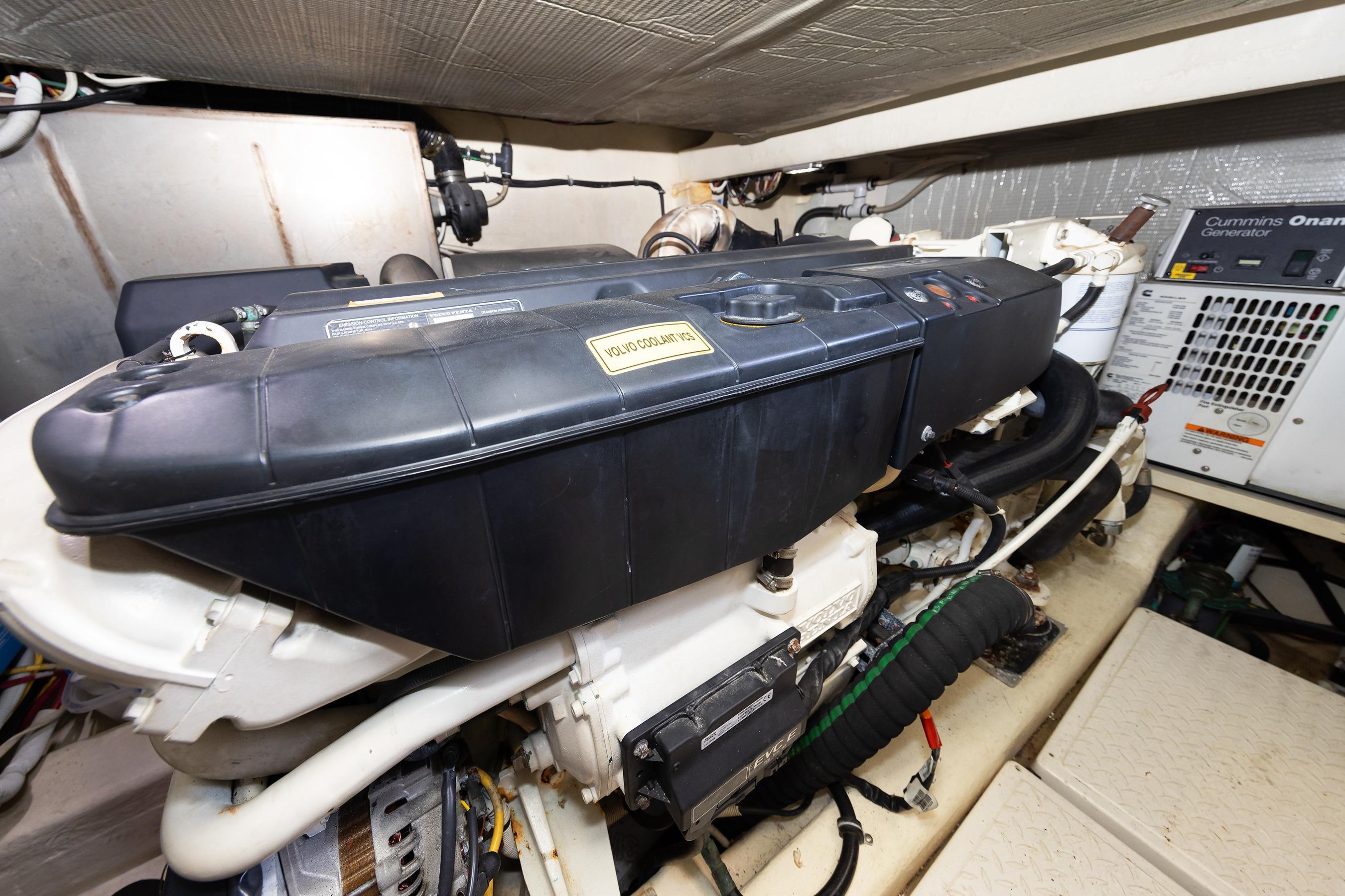Engine room of a 2014 Tiara 5000 Coupe with Cummins Onan generator.