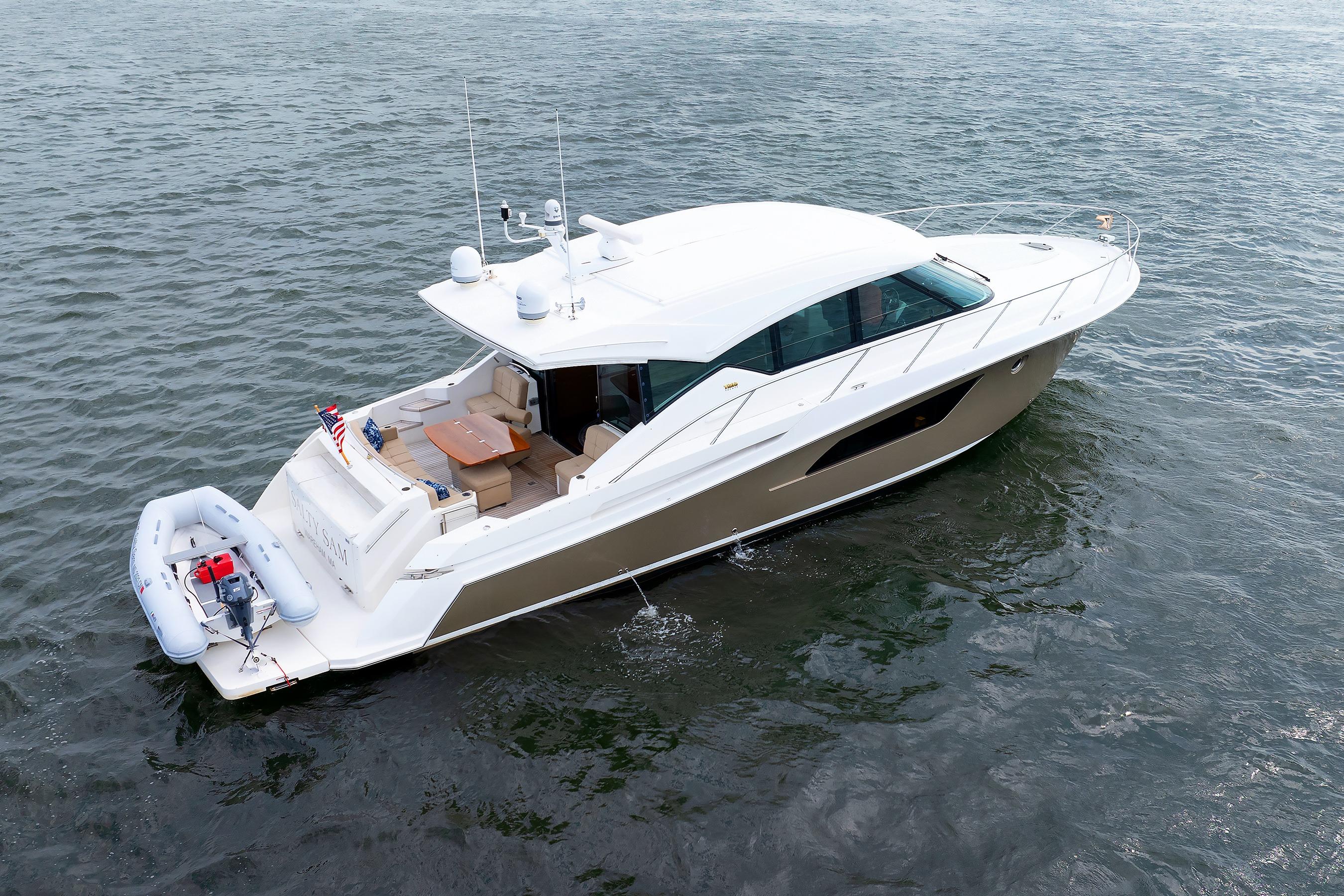 2014 Tiara 5000 Coupe yacht on water, featuring sleek design and spacious deck.