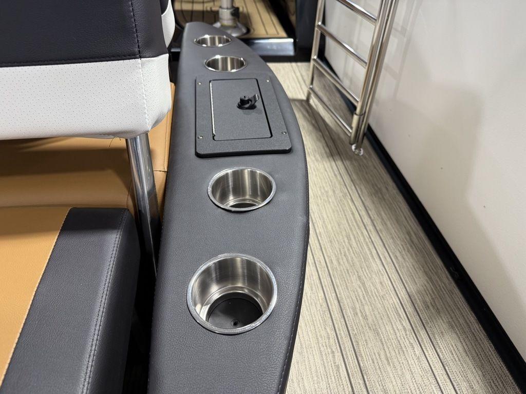 2025 Premier 230 Solaris RL boat interior with cup holders and seating.