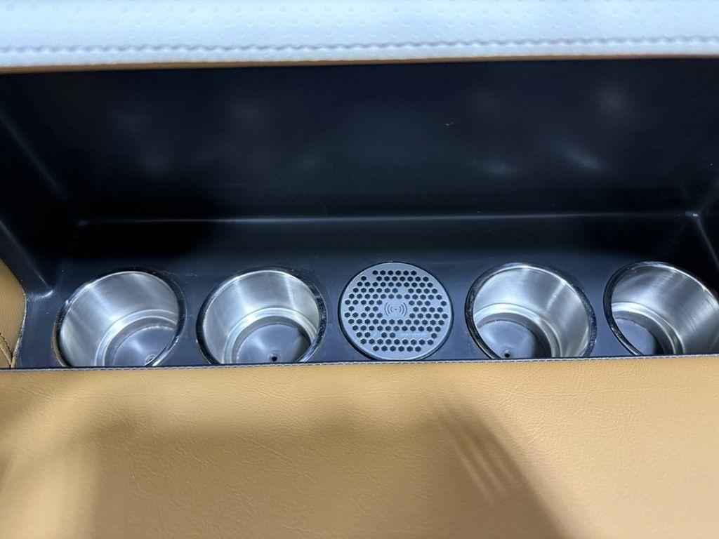 Cup holders and speaker in 2025 Premier 230 Solaris RL boat interior.