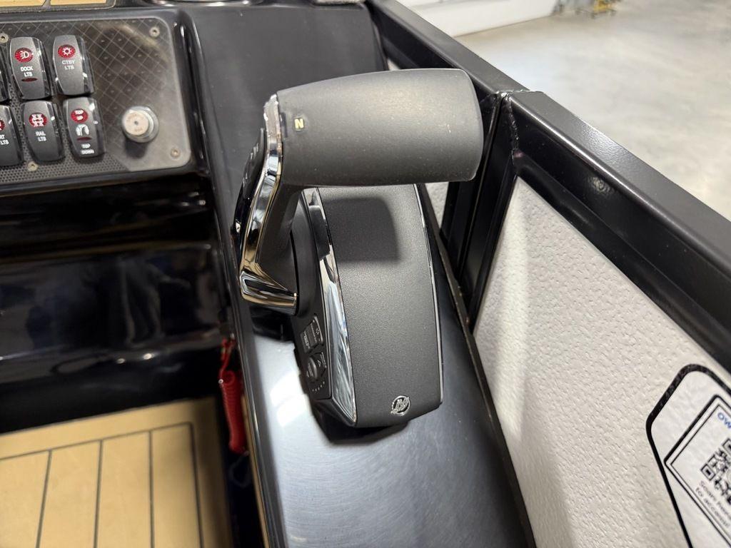 Throttle control of 2025 Premier 230 Solaris RL boat, featuring sleek design and modern controls.