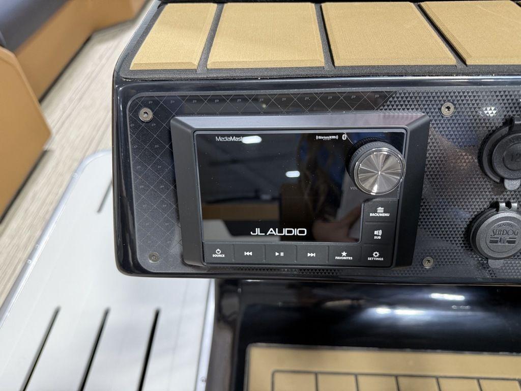 JL Audio system on 2025 Premier 230 Solaris RL boat dashboard.