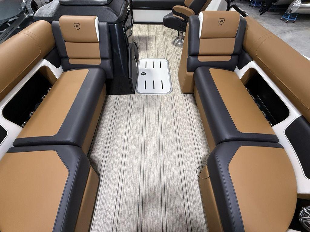 2025 Premier 230 Solaris RL interior with tan and black seating, modern design.