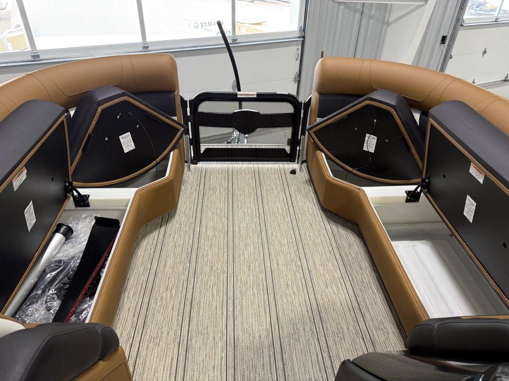 2025 Premier 230 Solaris RL interior with open storage compartments and sleek seating.