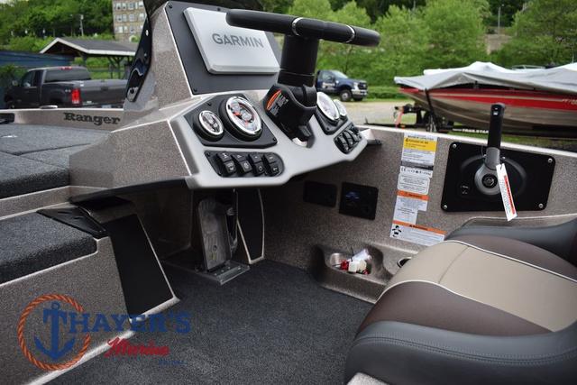 2025 Ranger Z185 boat dashboard with Garmin system and controls, featuring comfortable seating.