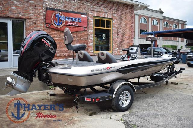 2025 Ranger Z185 boat at Thayer's Marine dealership, featuring a powerful outboard motor.
