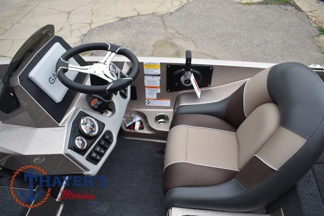 2025 Ranger Z185 boat interior with steering wheel and cushioned seat.