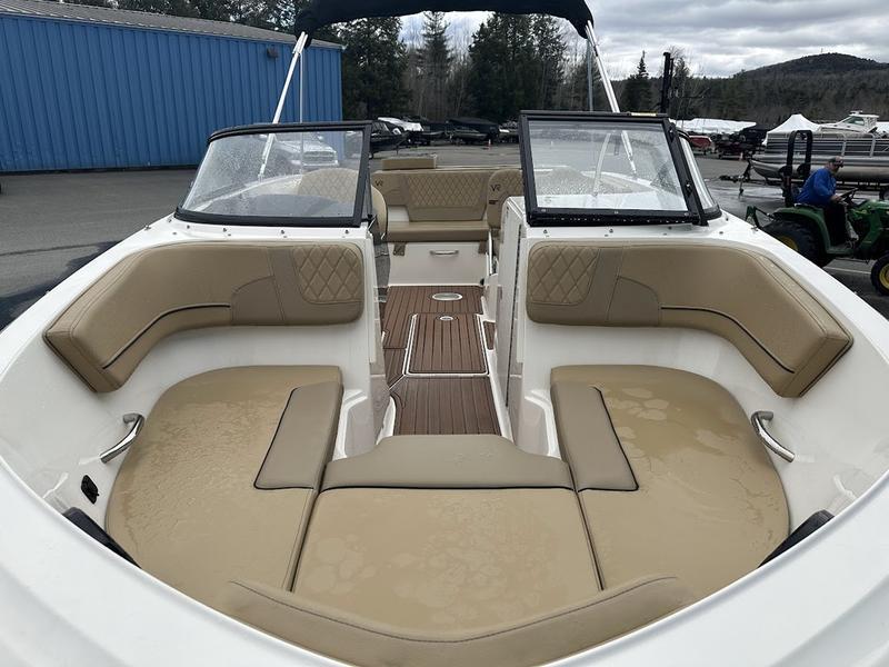 2023 Bayliner VR6 boat interior with tan seating and open deck layout.