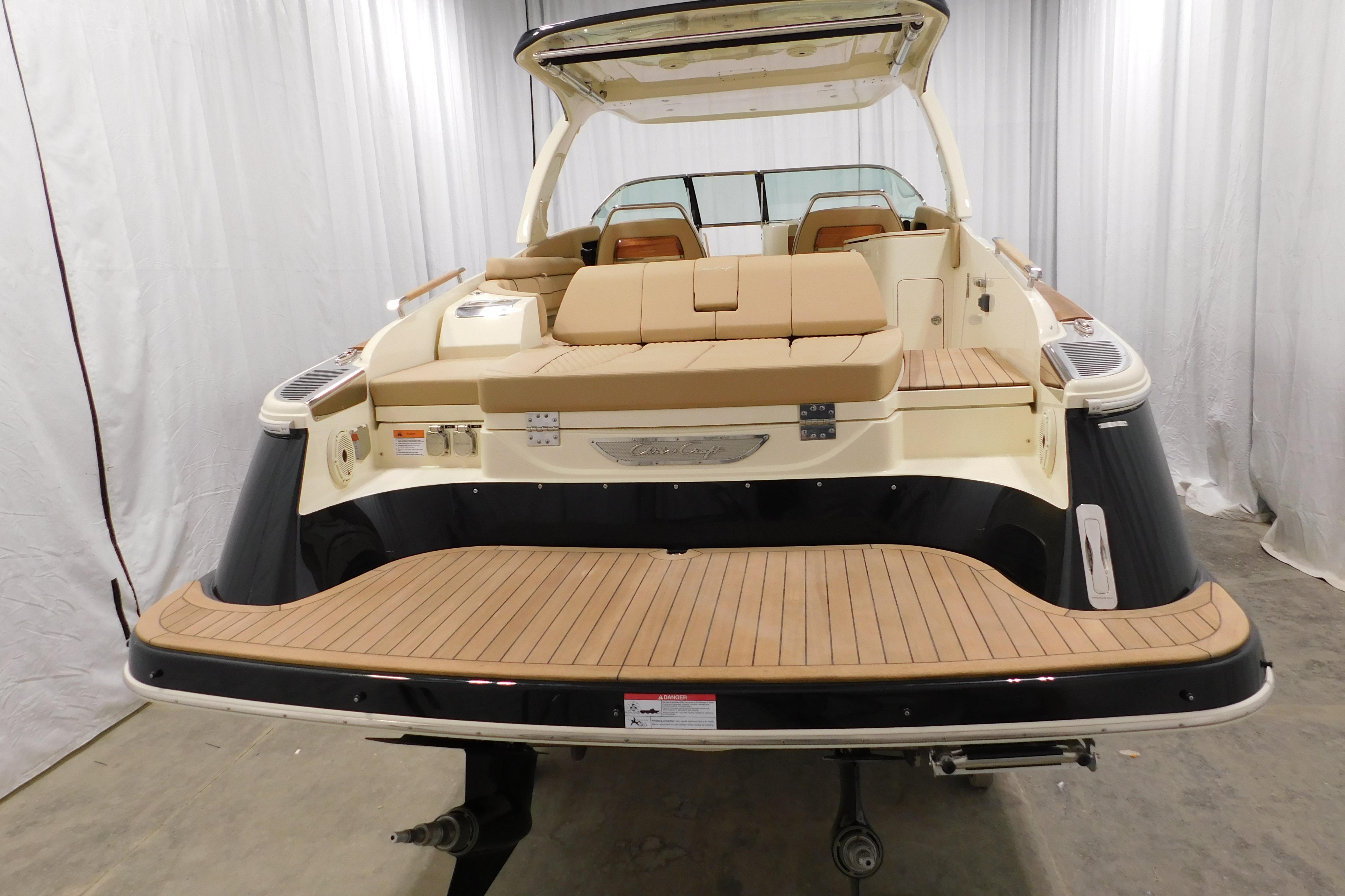2021 Chris-Craft Launch 35 GT boat, rear view, showcasing elegant deck and seating.