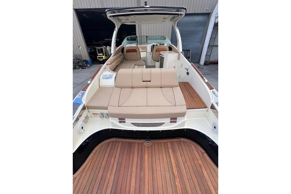 2021 Chris-Craft Launch 35 GT boat interior with luxurious seating and wooden deck.