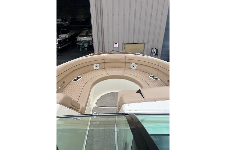 2021 Chris-Craft Launch 35 GT boat with spacious tan seating area.