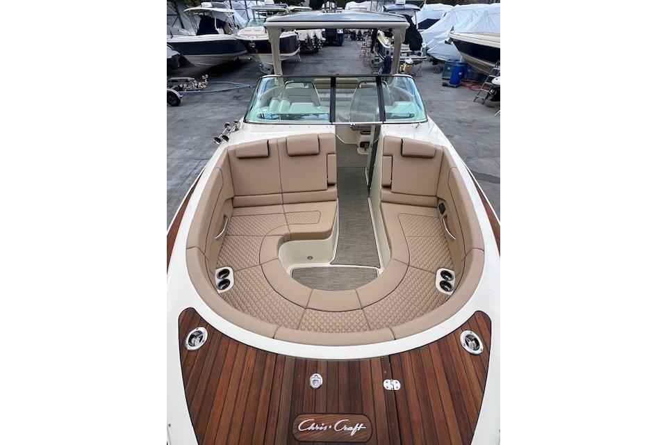 2021 Chris-Craft Launch 35 GT boat with luxurious seating and elegant wood finish.