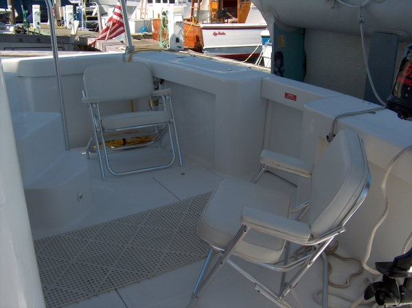 Shaded Cockpit with Padded Deck Chairs