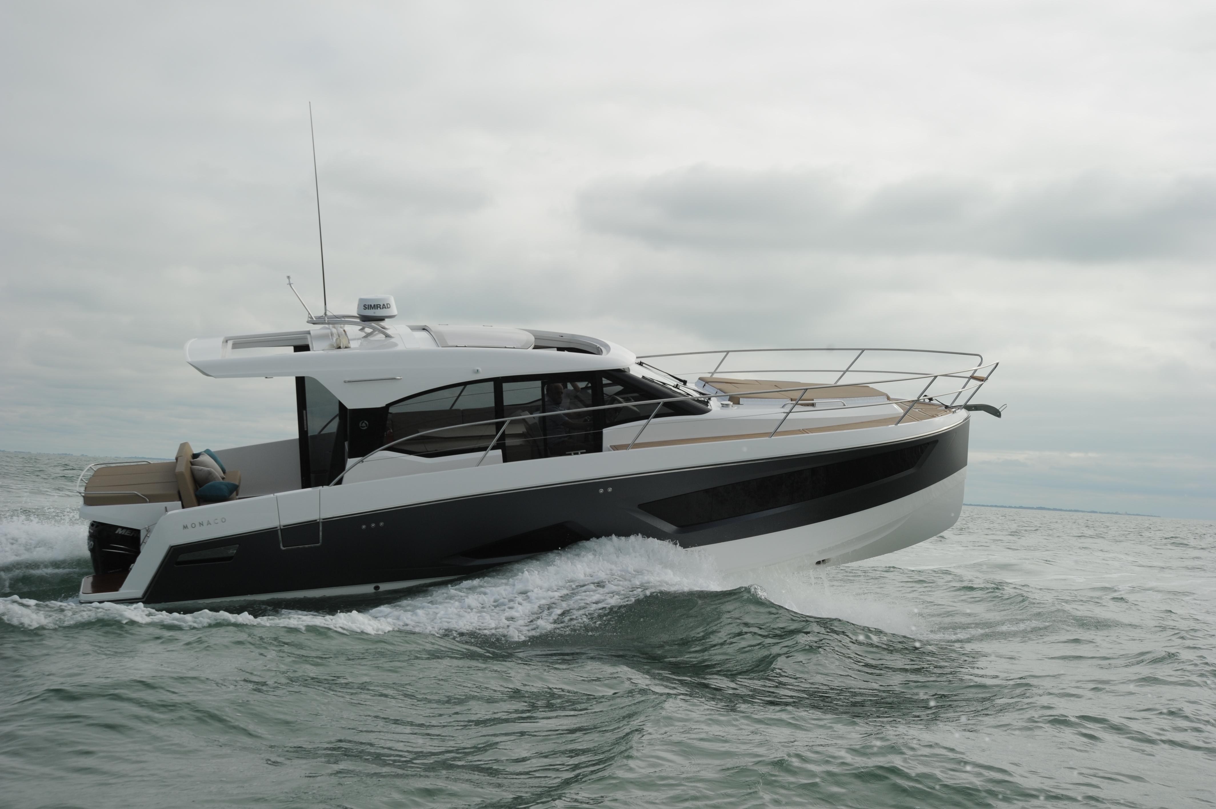 Skamander-Monaco Coupe 2025 -FL-US-2025 Skamander Monaco Coupe yacht cruising on open water under cloudy skies.-9544362
