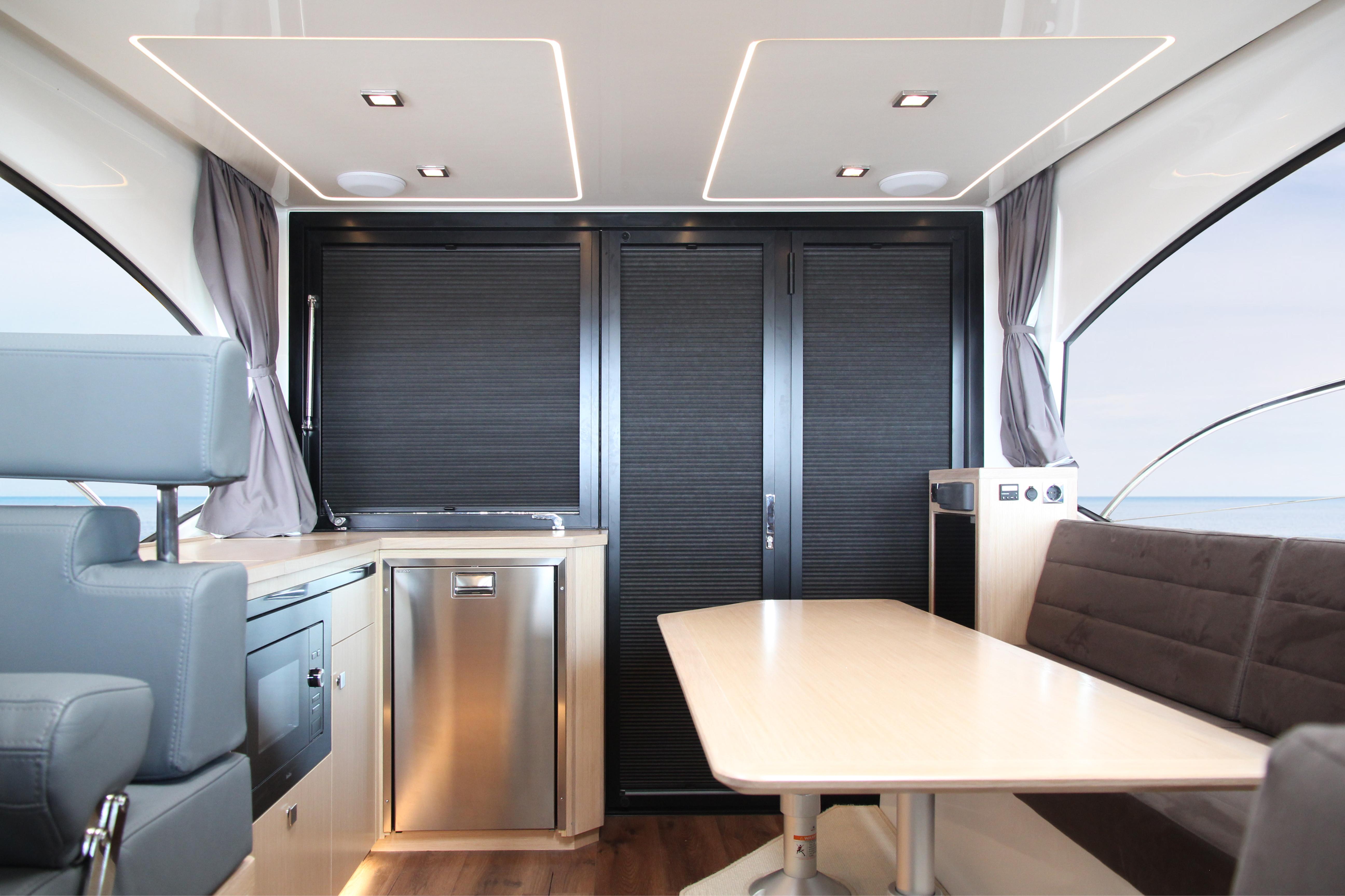 Skamander-Monaco Coupe 2025 -FL-US-Luxurious interior of 2025 Skamander Monaco Coupe with modern seating and sleek design.-9544362 | Thumbnail