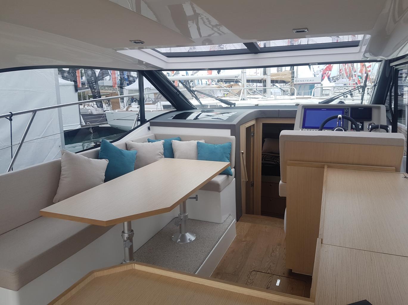 Skamander-Monaco Coupe 2025 -FL-US-Interior of 2025 Skamander Monaco Coupe yacht with modern seating and navigation area.-9544362 | Thumbnail