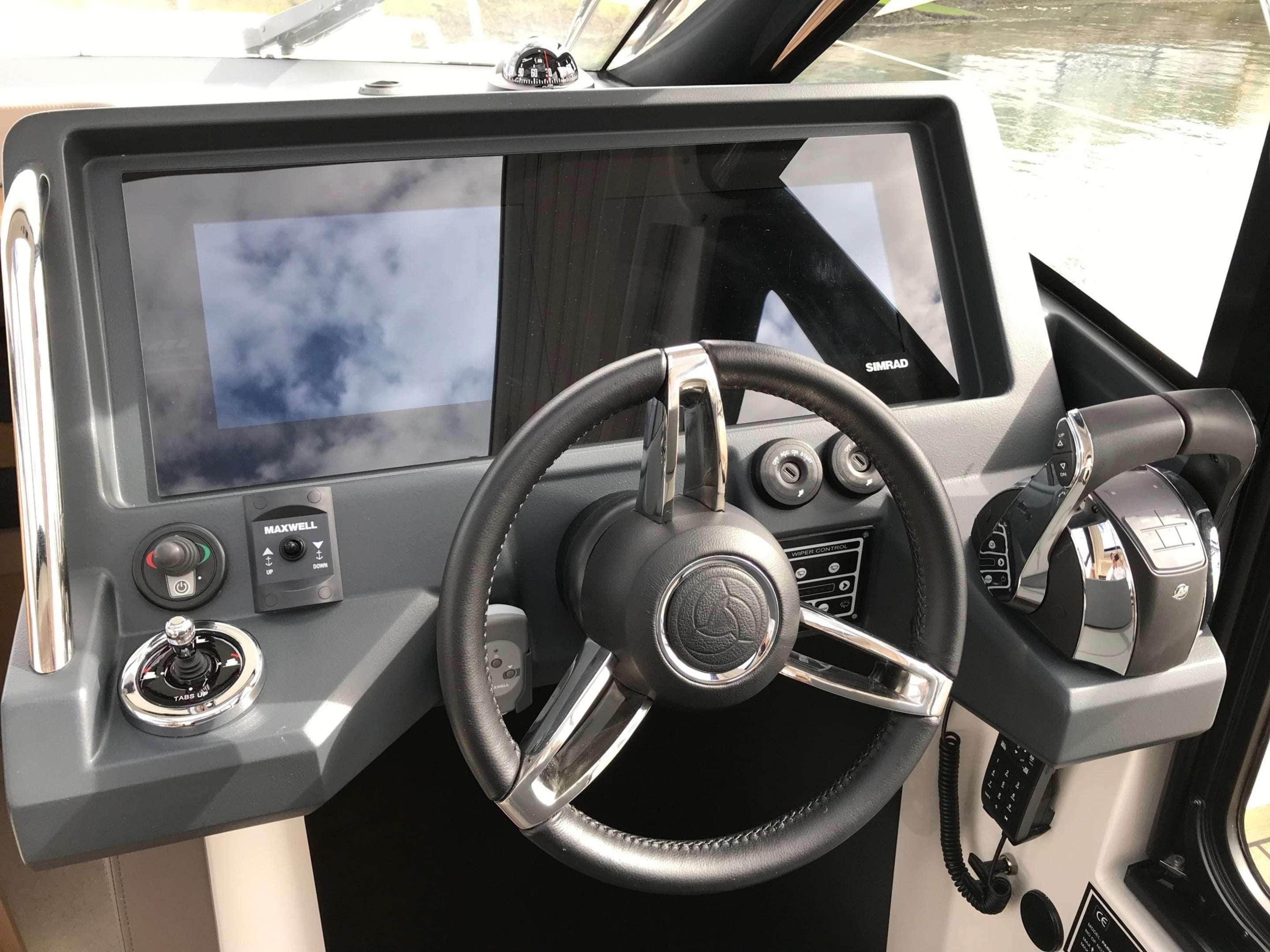 Skamander-Monaco Coupe 2025 -FL-US-2025 Skamander Monaco Coupe dashboard with steering wheel and modern controls.-9544362 | Thumbnail