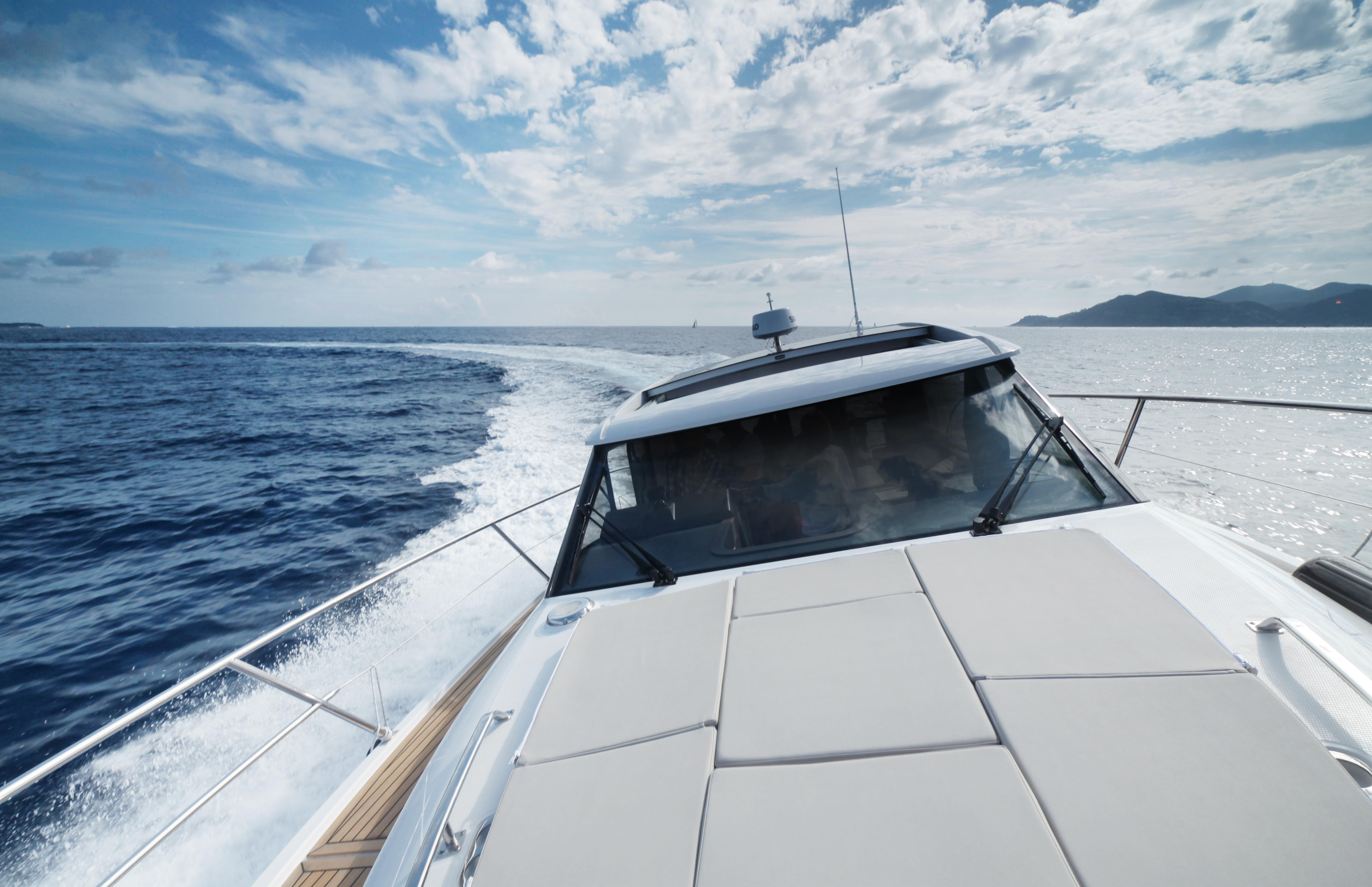Skamander-Monaco Coupe 2025 -FL-US-2025 Skamander Monaco Coupe yacht cruising on open sea under a partly cloudy sky.-9544362 | Thumbnail