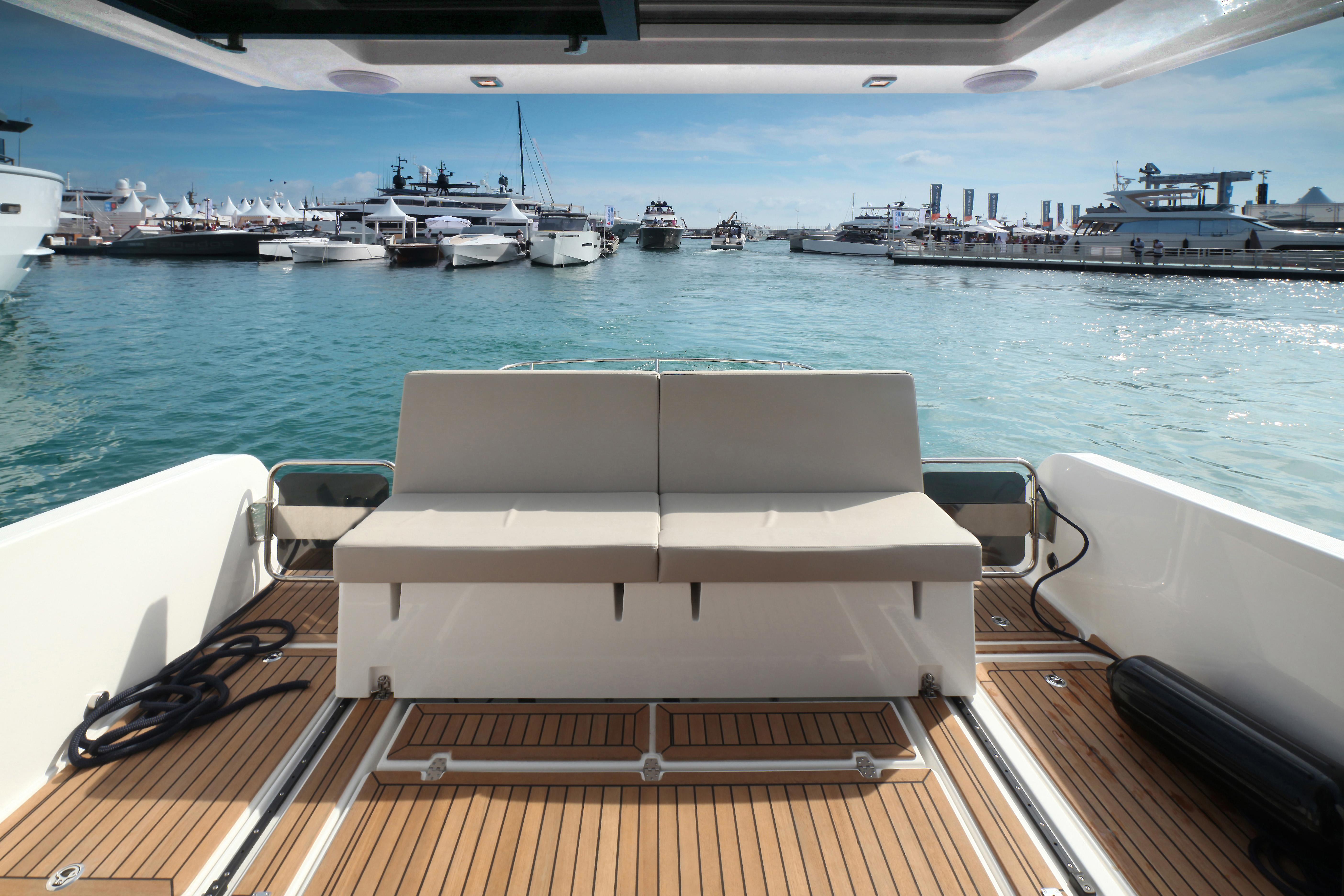 Skamander-Monaco Coupe 2025 -FL-US-Luxury yacht interior with a view of a marina, featuring the 2025 Skamander Monaco Coupe.-9544362 | Thumbnail