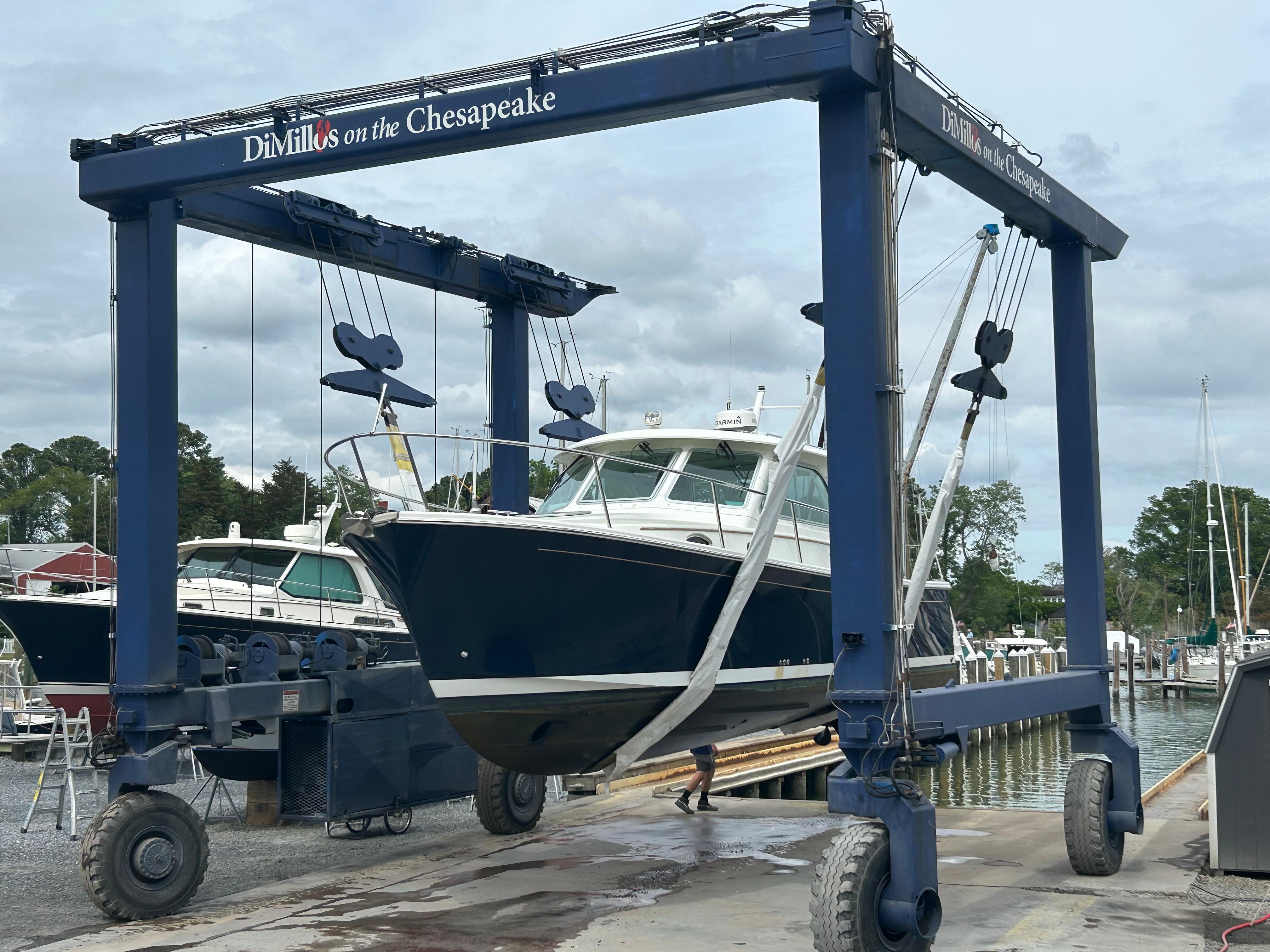 2018 Back Cove 32 boat being lifted at DiMillou0027s on the Chesapeake marina.