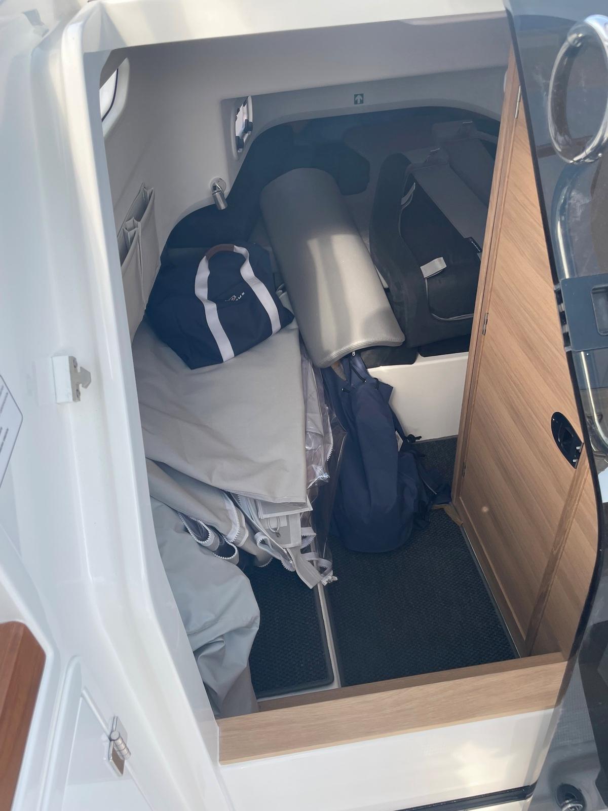 Nimbus-T9 2023-ANN #121 MD-US-Interior cabin of 2023 Nimbus T9 #121 Twin Engine boat with storage and gear.-9024384 | Thumbnail