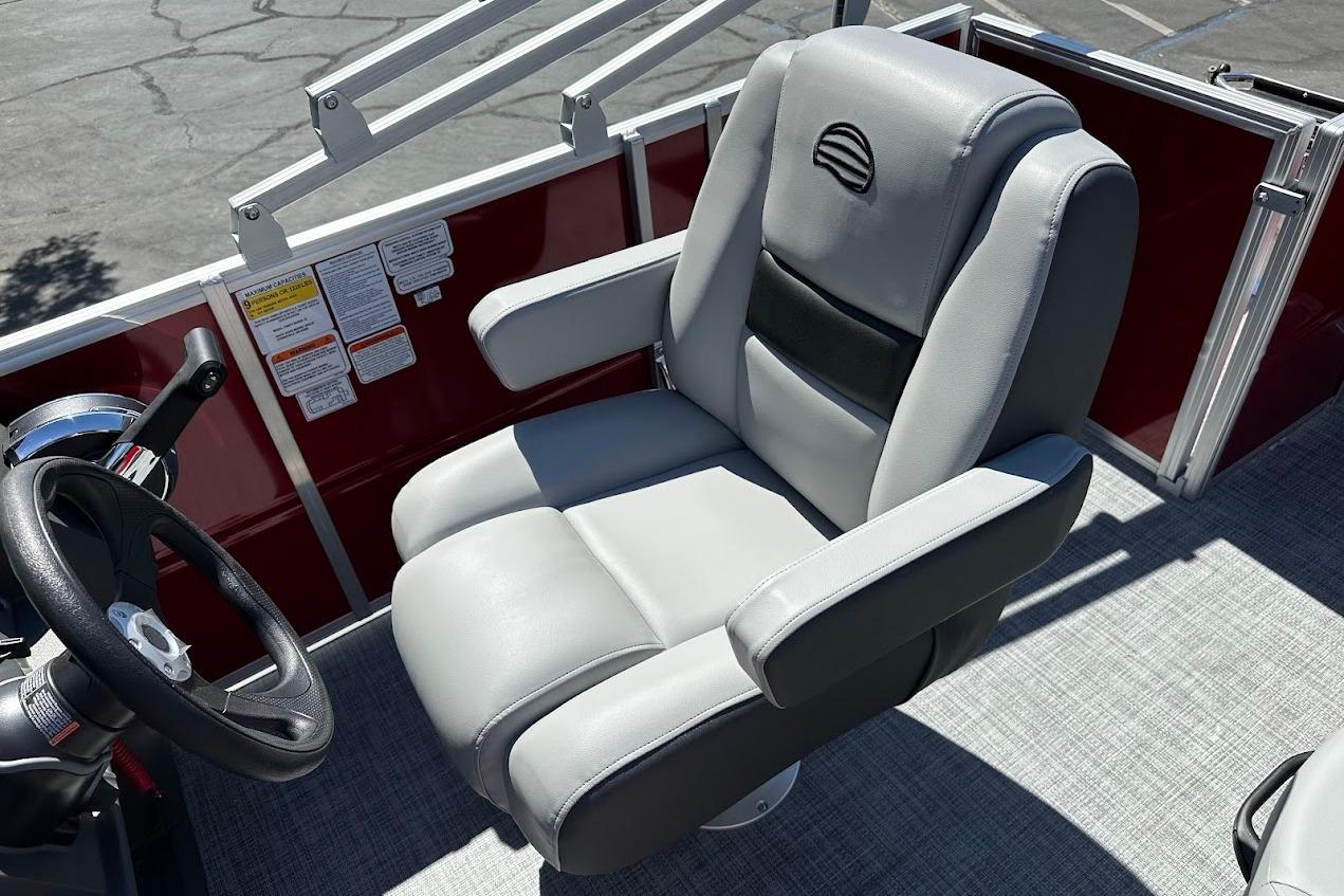 Captain's chair on 2026 Sun Tracker Party Barge 18 DLX pontoon boat.