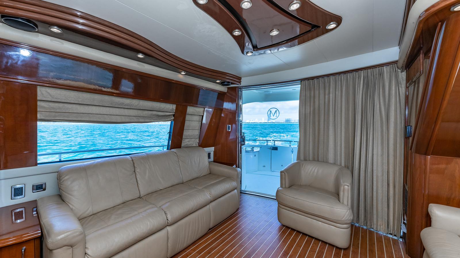 Marquis-59 2005-Next to Sell FL-US-Luxurious interior of a 2005 Marquis 59 yacht with leather seating and ocean view.-9654462 | Thumbnail