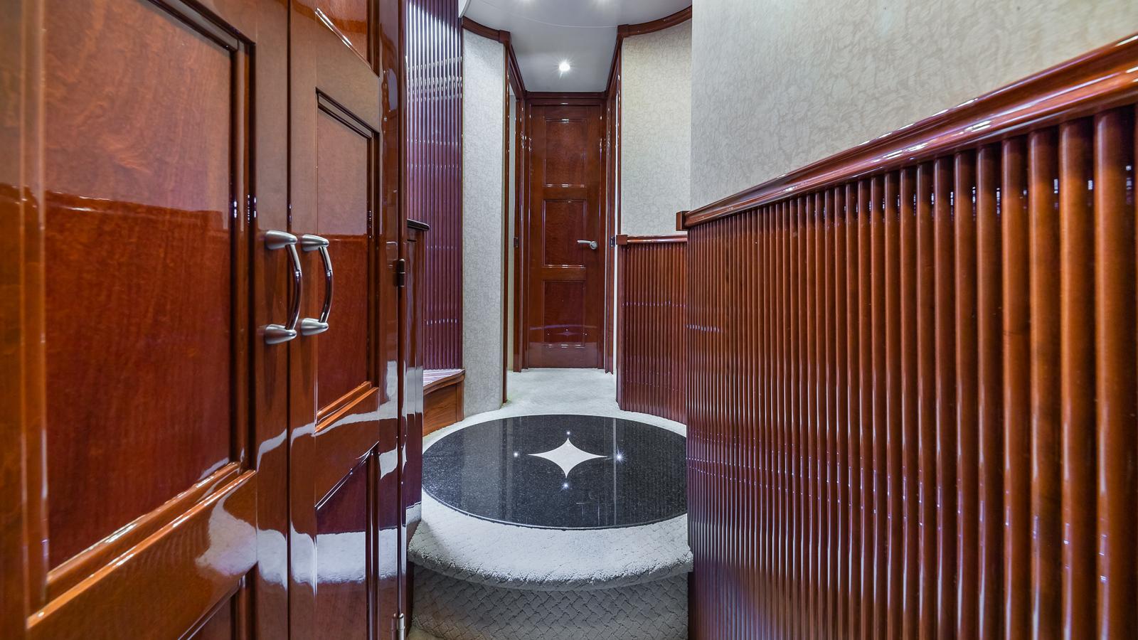 Marquis-59 2005-Next to Sell FL-US-Luxurious wood-paneled hallway in a 2005 Marquis 59 yacht.-9654462 | Thumbnail