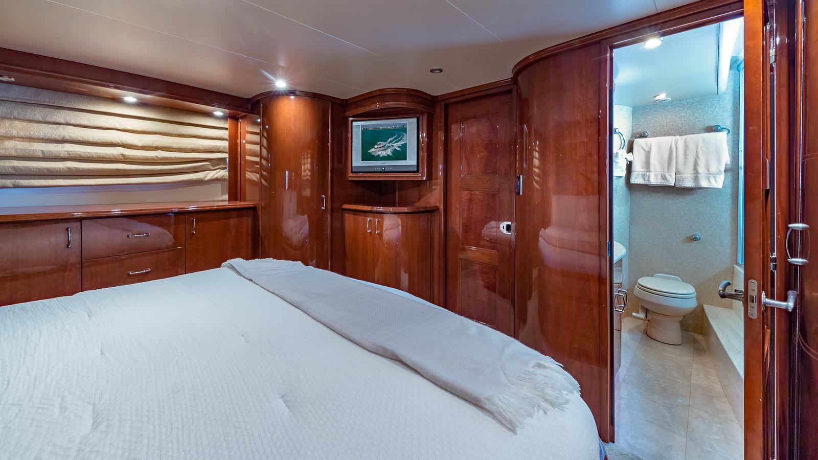 Marquis-59 2005-Next to Sell FL-US-Luxurious 2005 Marquis 59 yacht bedroom with ensuite bathroom, elegant wood finishes.-9654462 | Thumbnail