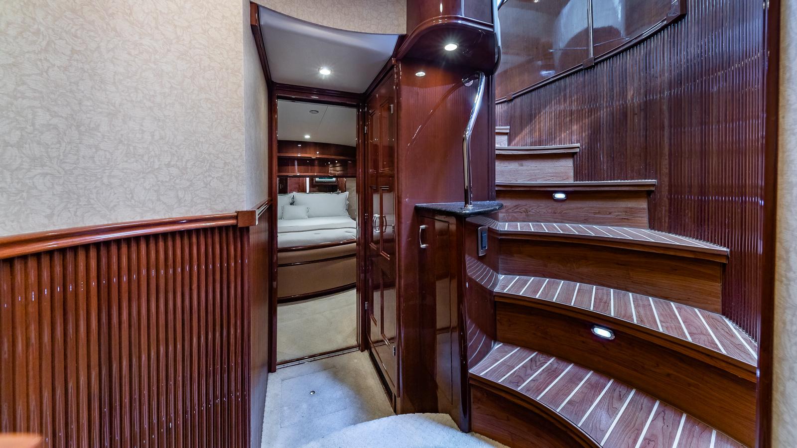 Marquis-59 2005-Next to Sell FL-US-Luxurious interior of 2005 Marquis 59 yacht with elegant wooden staircase and cozy cabin.-9654462 | Thumbnail