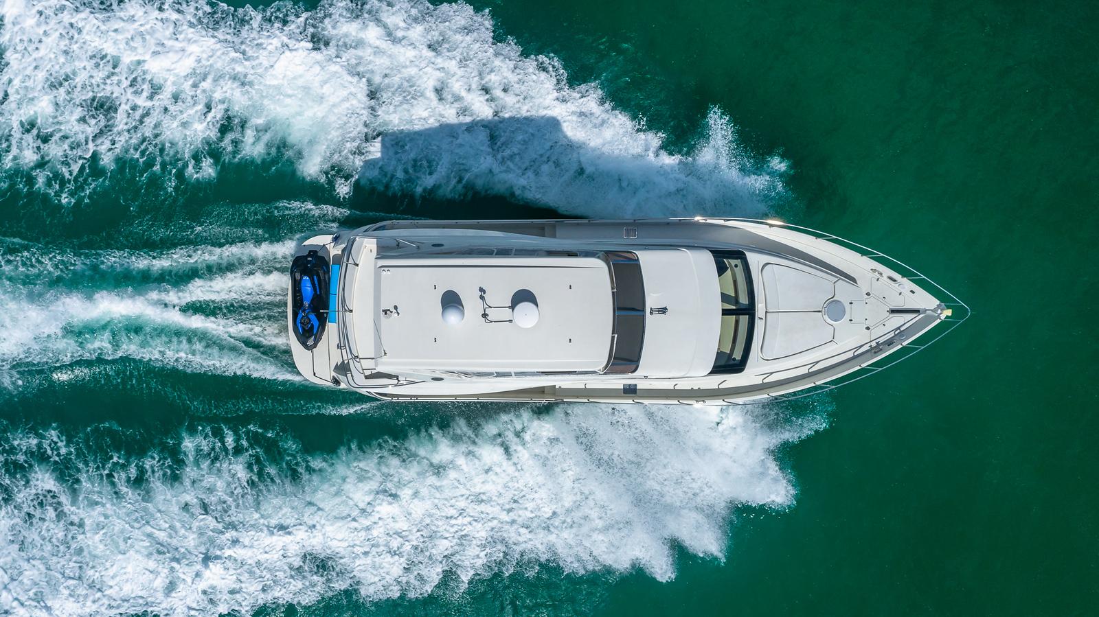 Marquis-59 2005-Next to Sell FL-US-Aerial view of 2005 Marquis 59 yacht cruising on turquoise water.-9654462 | Thumbnail