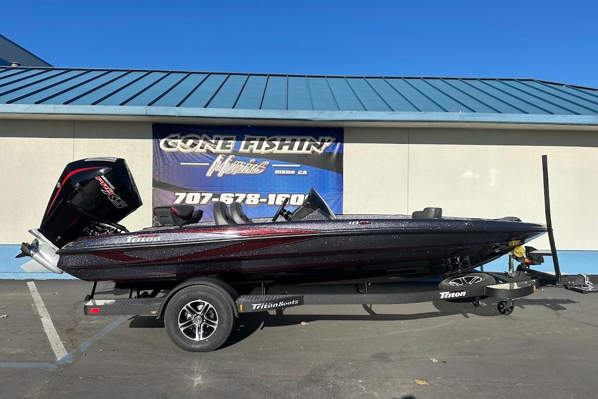 2026 Triton 18 TrX boat on trailer, displayed at Gone Fishin' Marine dealership.