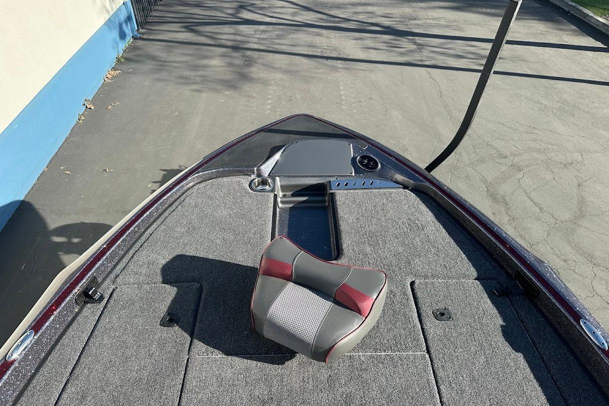 2026 Triton 18 TrX boat deck with seating and control panel.