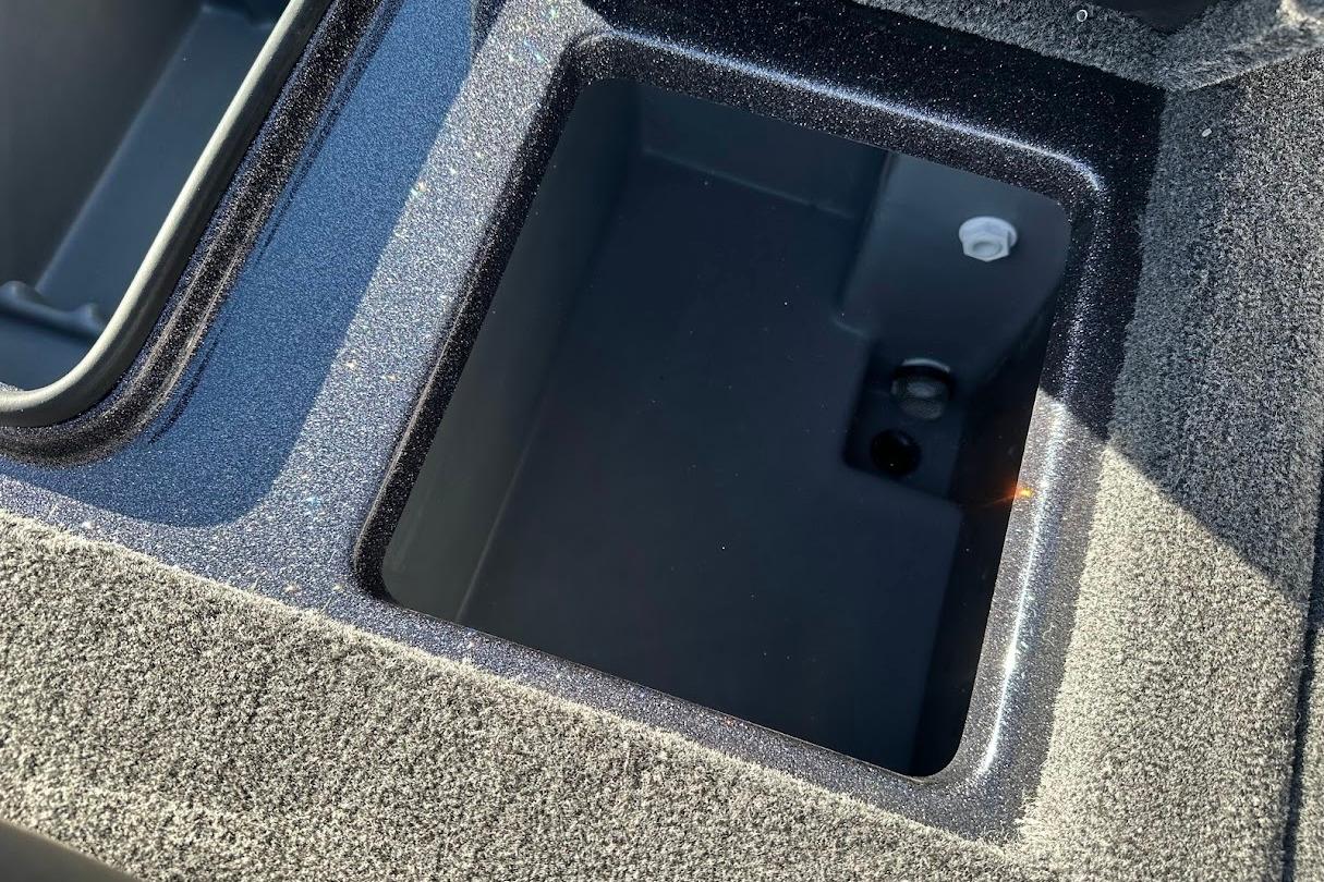 Storage compartment of 2026 Triton 18 TrX boat, featuring a sleek, durable design.