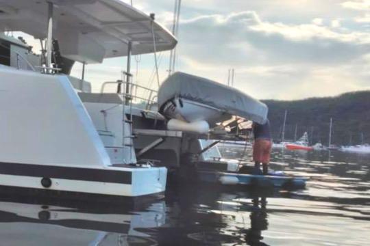 Carbon OC Tender w/20HP Tohatsu