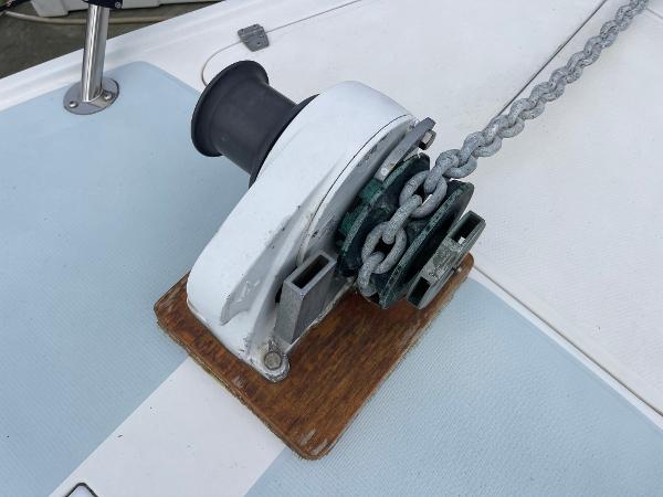 Anchor windlass on 1984 Catalina 30 sailboat deck.