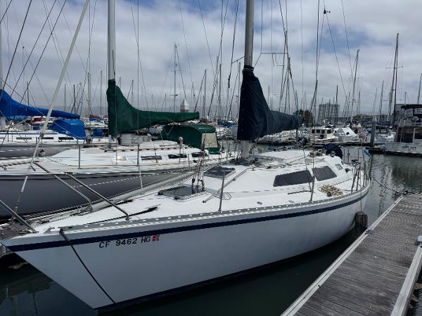 1984 Camper & Nicholsons Nicholson 35 sailboat docked in a marina.
