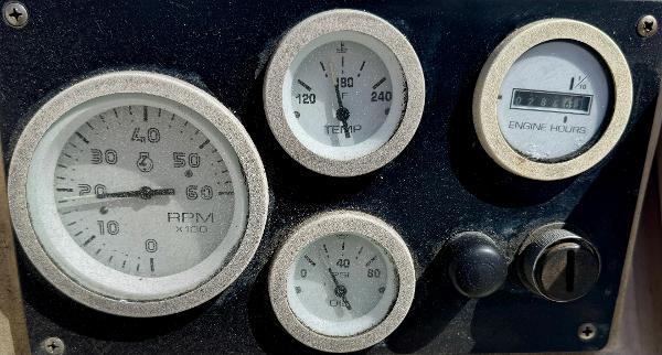 Control panel of a 1984 Camper & Nicholsons Nicholson 35 yacht, displaying RPM, temperature, and engine hours.