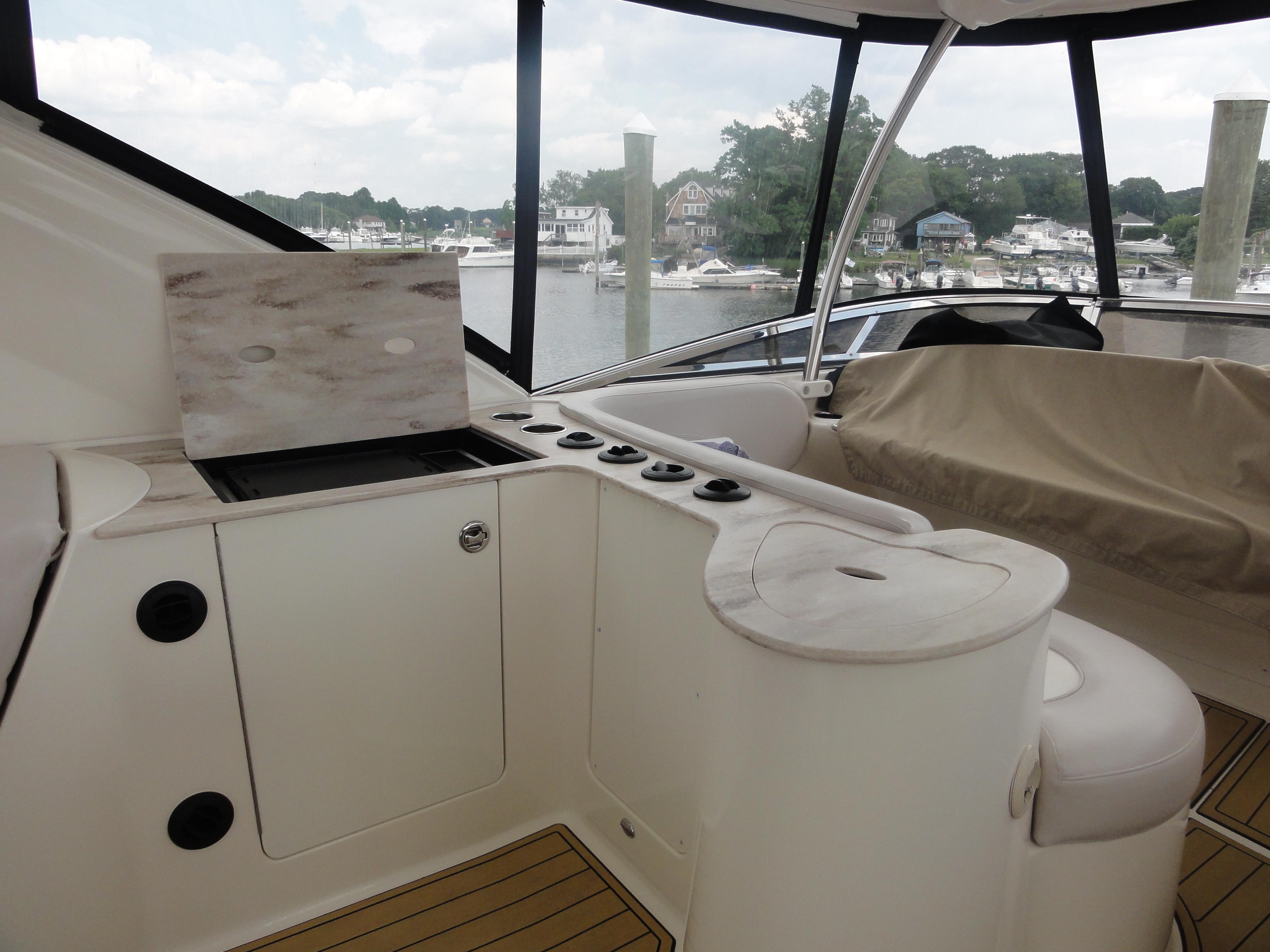 Meridian-441 Sedan 2009-Be Lisamo RI-US-2009 Meridian 441 Sedan yacht interior with seating and kitchenette, overlooking marina.-9714633 | Thumbnail