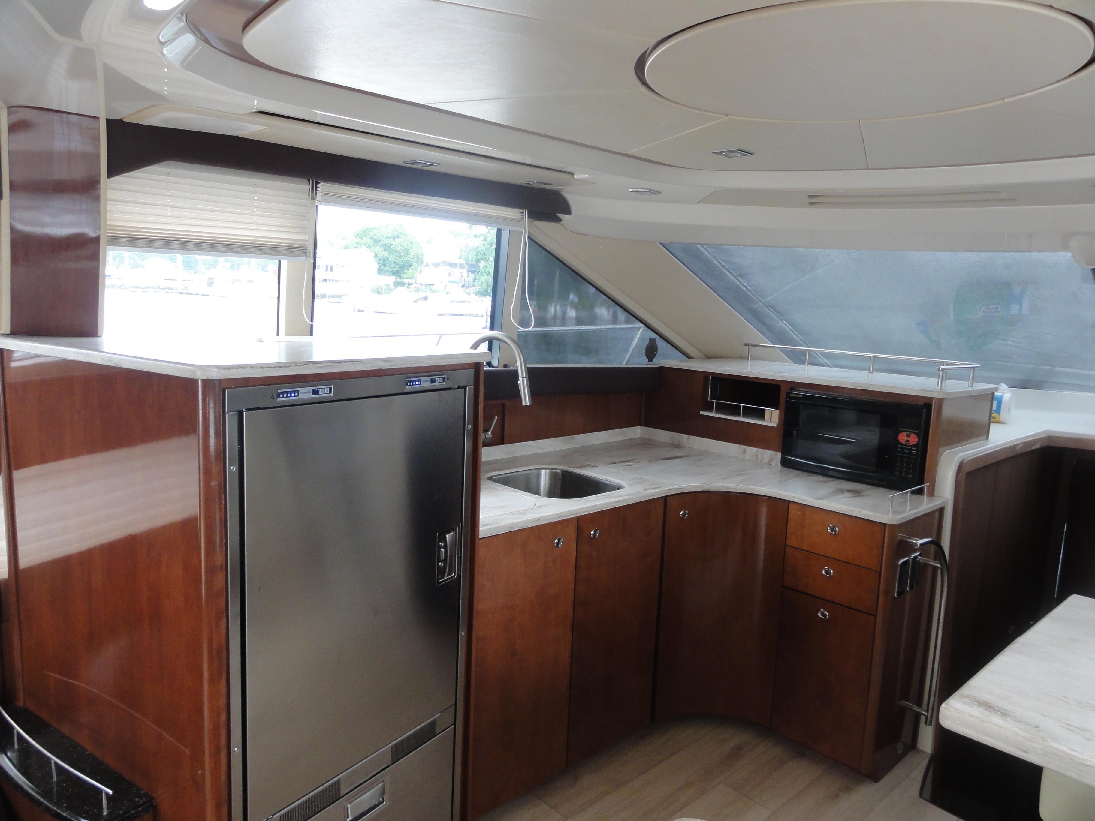 Meridian-441 Sedan 2009-Be Lisamo RI-US-Luxurious kitchen interior of 2009 Meridian 441 Sedan yacht with modern appliances.-9714633 | Thumbnail