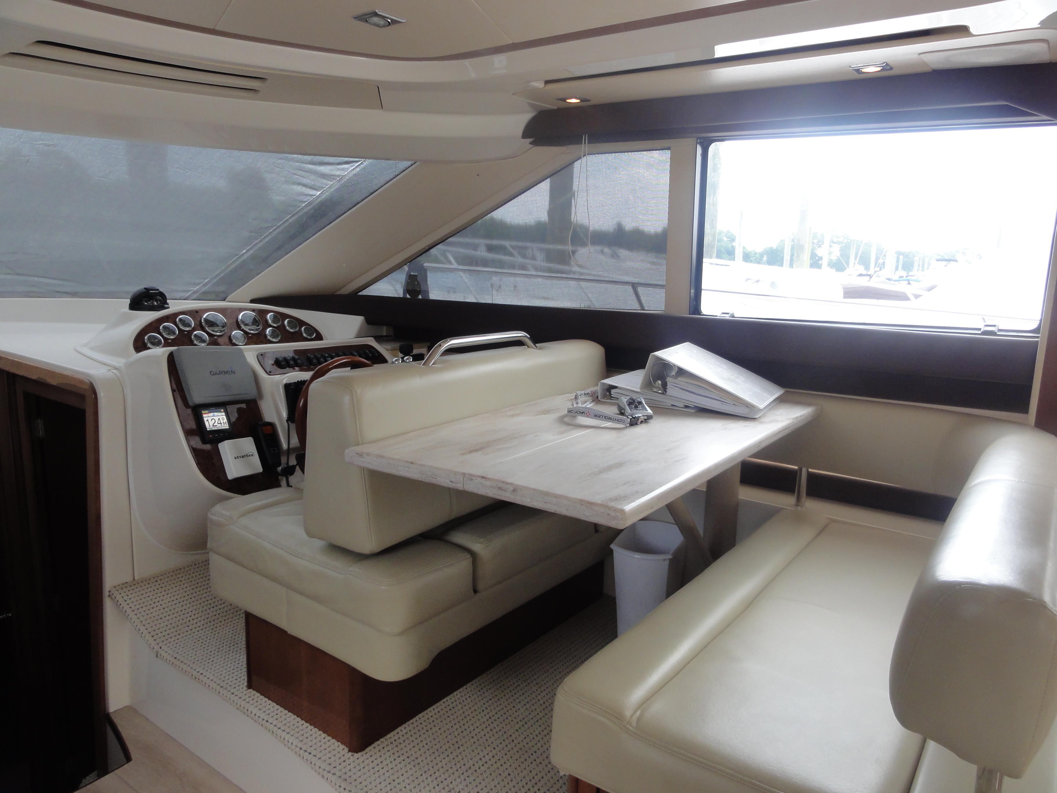 Meridian-441 Sedan 2009-Be Lisamo RI-US-Interior of 2009 Meridian 441 Sedan yacht with helm and seating area.-9714633 | Thumbnail