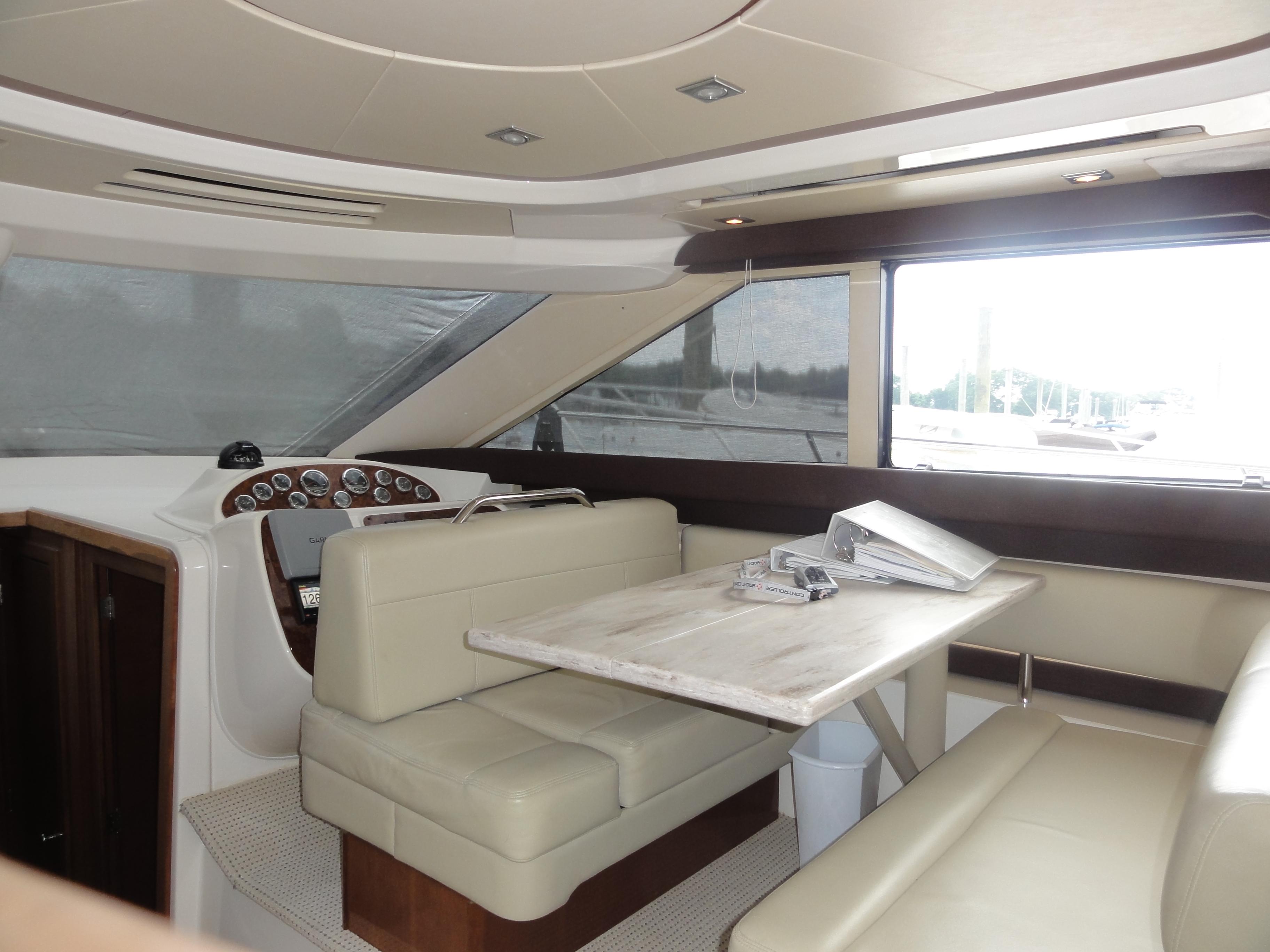 Meridian-441 Sedan 2009-Be Lisamo RI-US-Interior of 2009 Meridian 441 Sedan yacht with beige seating and wooden table.-9714633 | Thumbnail