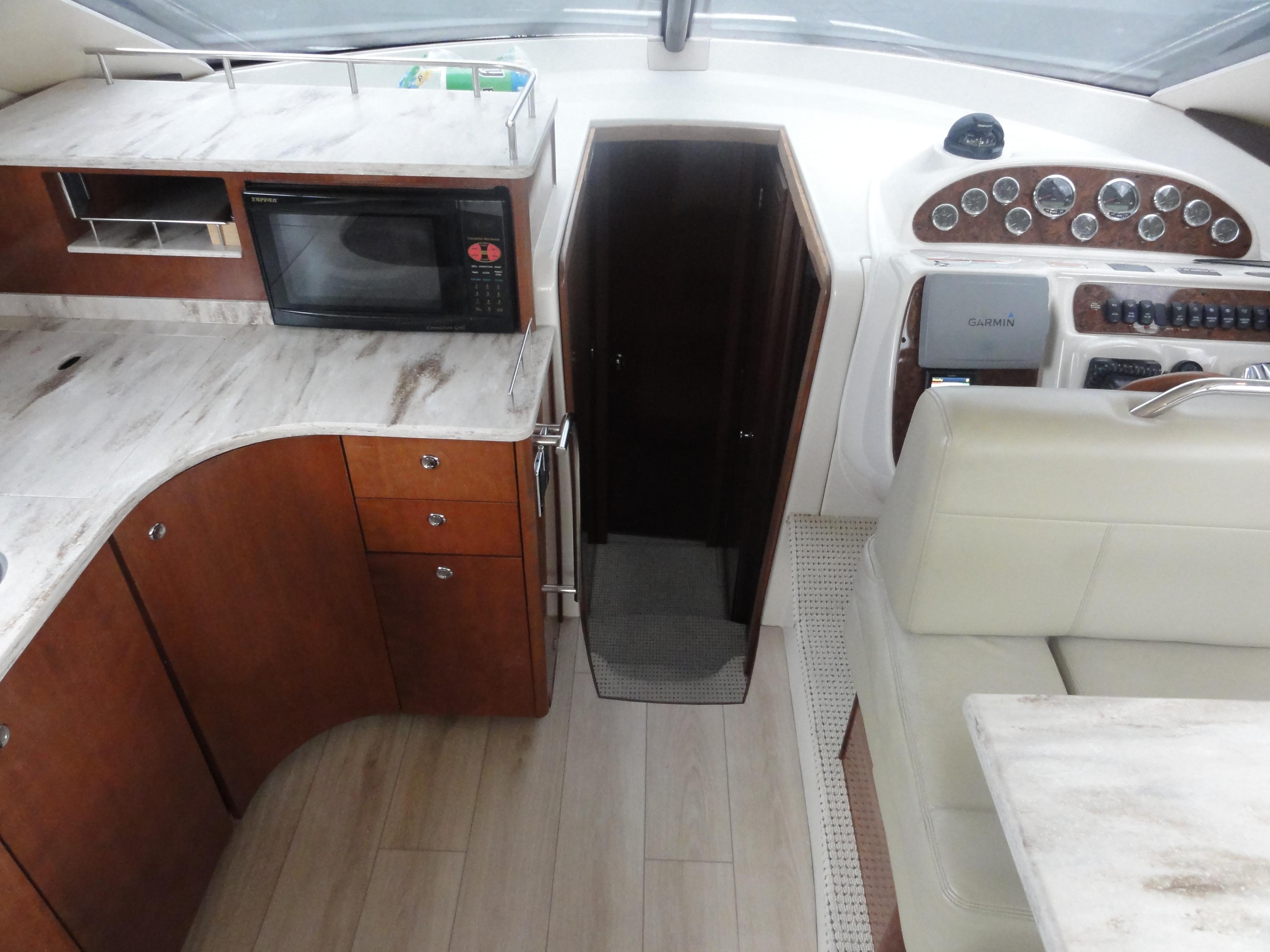Meridian-441 Sedan 2009-Be Lisamo RI-US-2009 Meridian 441 Sedan interior with kitchen, microwave, and control panel.-9714633 | Thumbnail