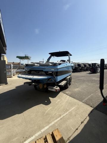 2025 Centurion Fe25 boat on trailer in outdoor setting.