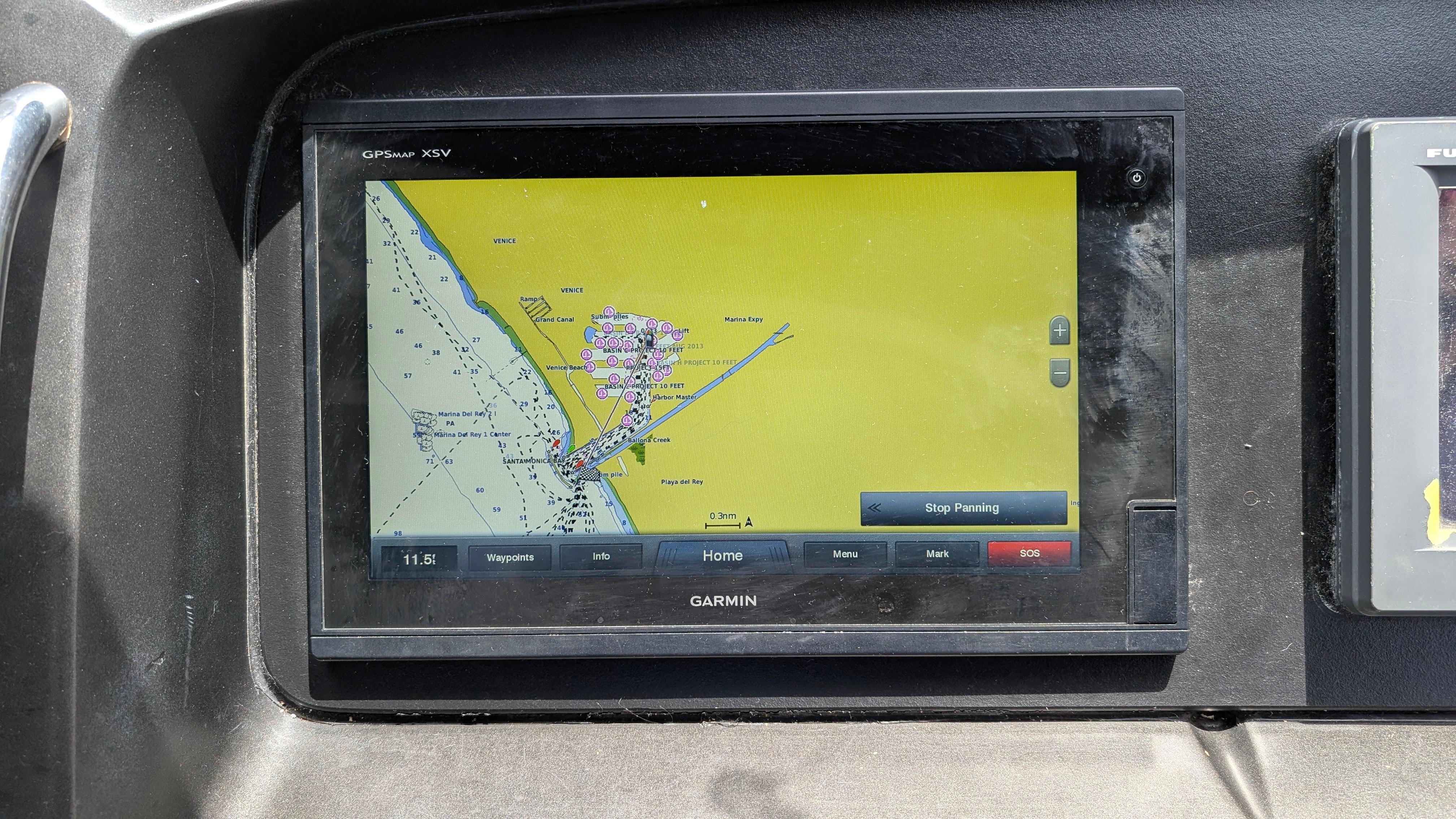 Garmin GPS display on 2004 Sunseeker Portofino yacht, showing nautical map.