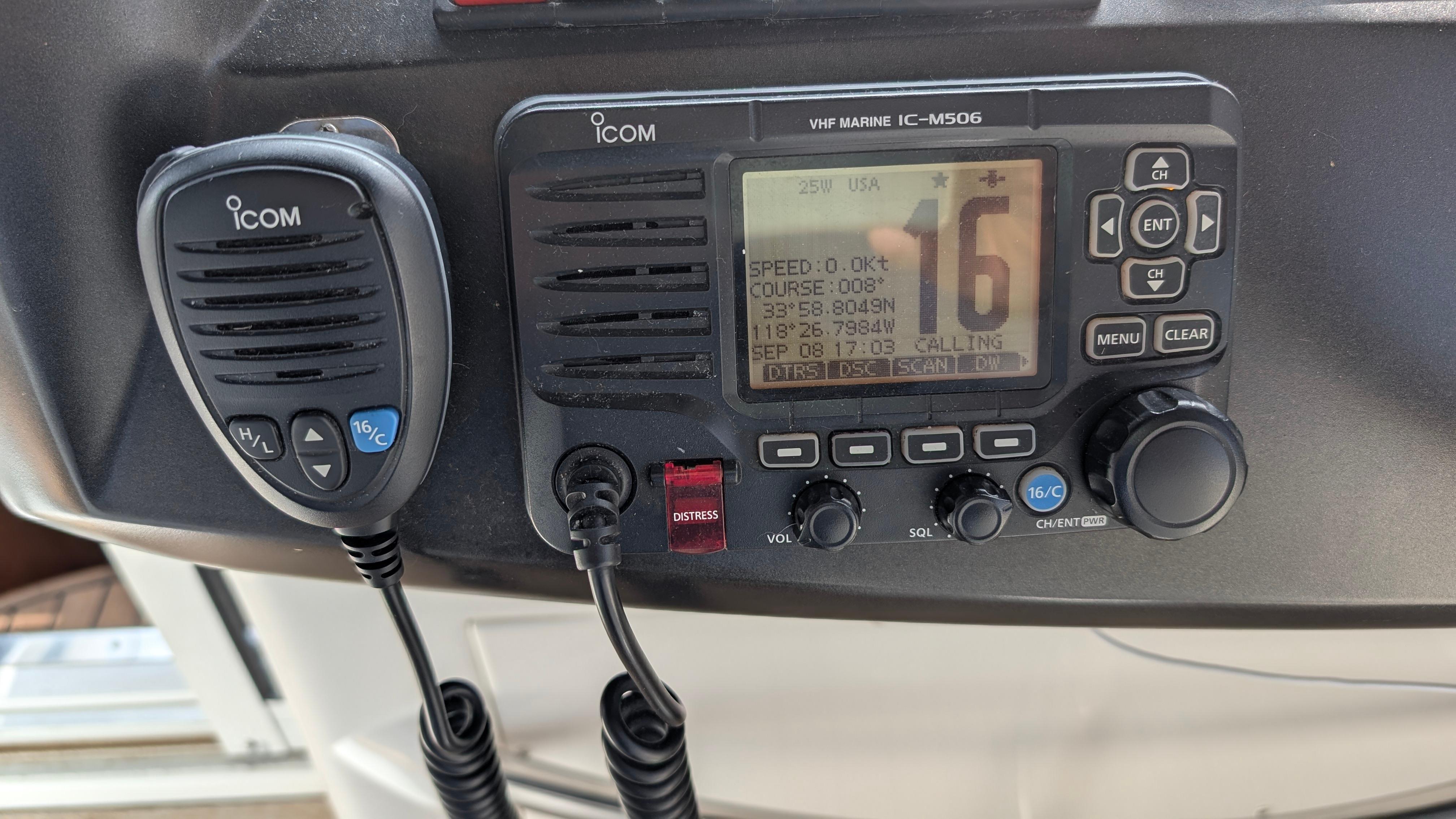 VHF marine radio on 2004 Sunseeker Portofino yacht dashboard.