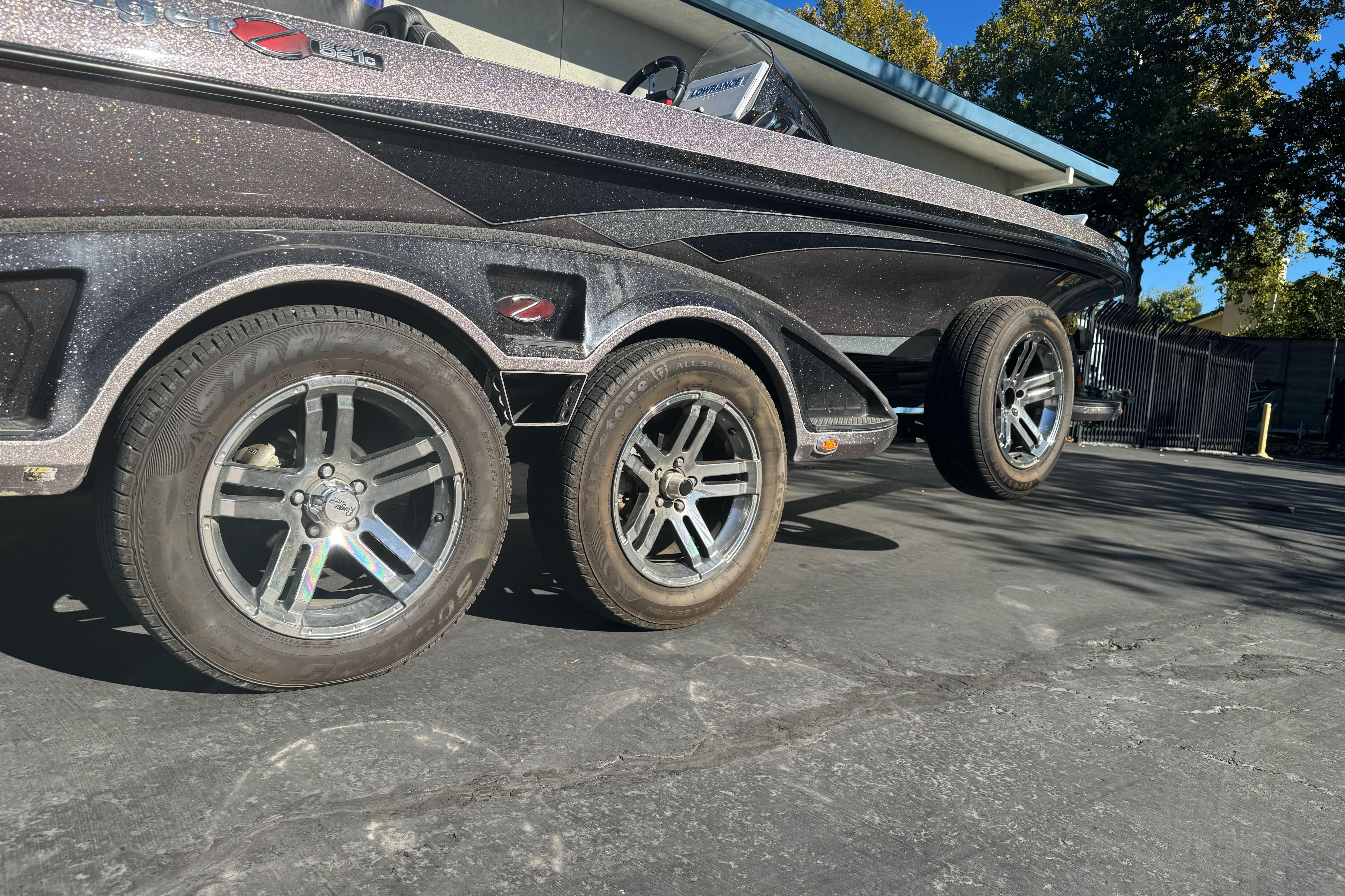 2020 Ranger Z521C Ranger Cup boat on trailer, showcasing sleek design and alloy wheels.